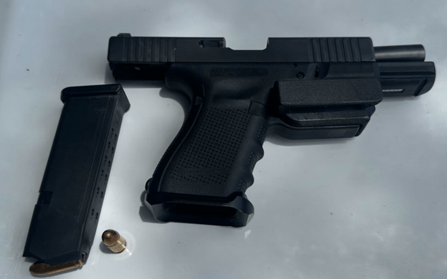 Loaded Glock 19 handgun recovered from suspect's vehicle who Pulls Gun On Bicyclist